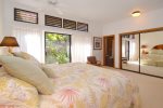 Master bedroom with king bed and small lanai